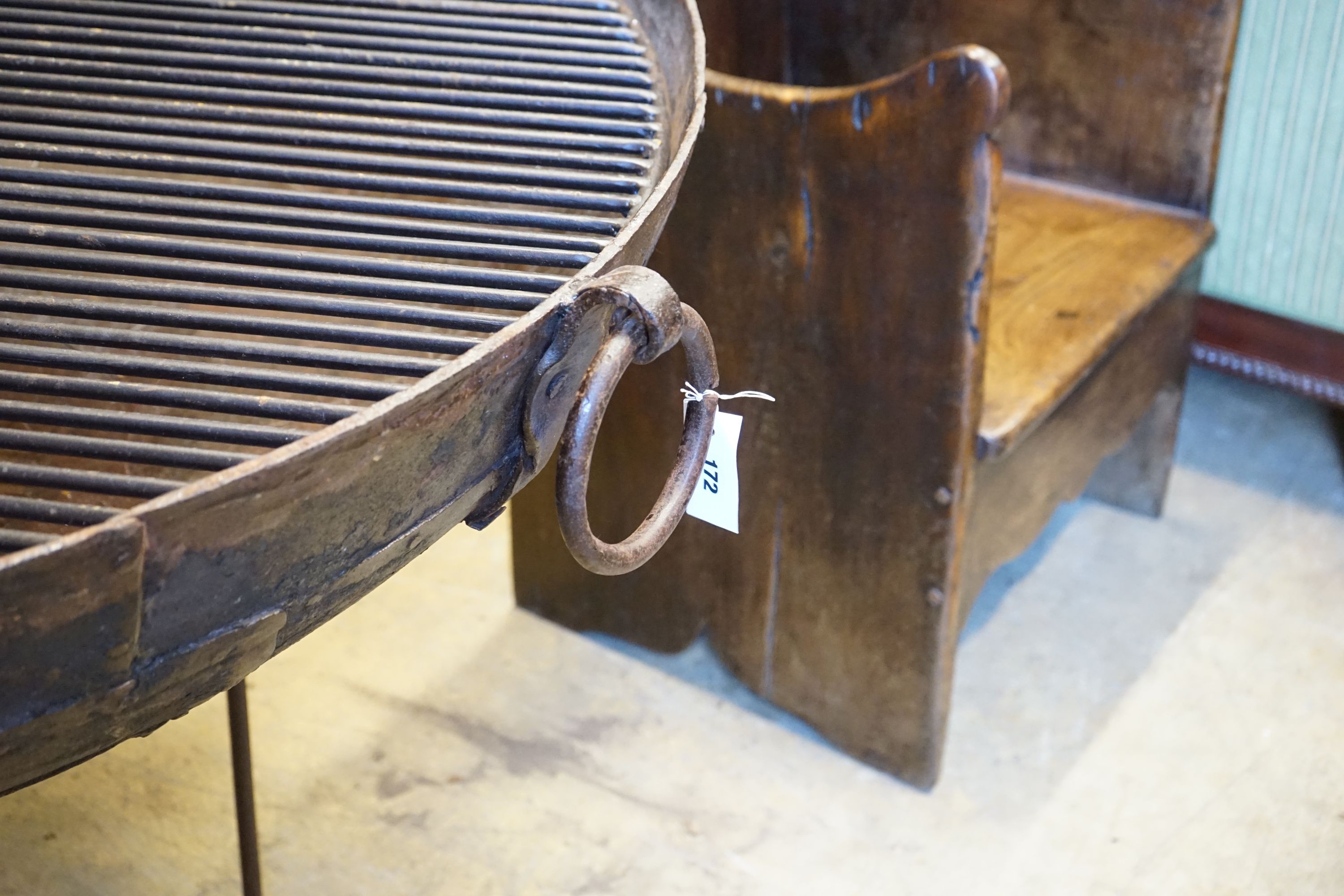 A wrought iron fire pit, diameter 61cm height 57cm